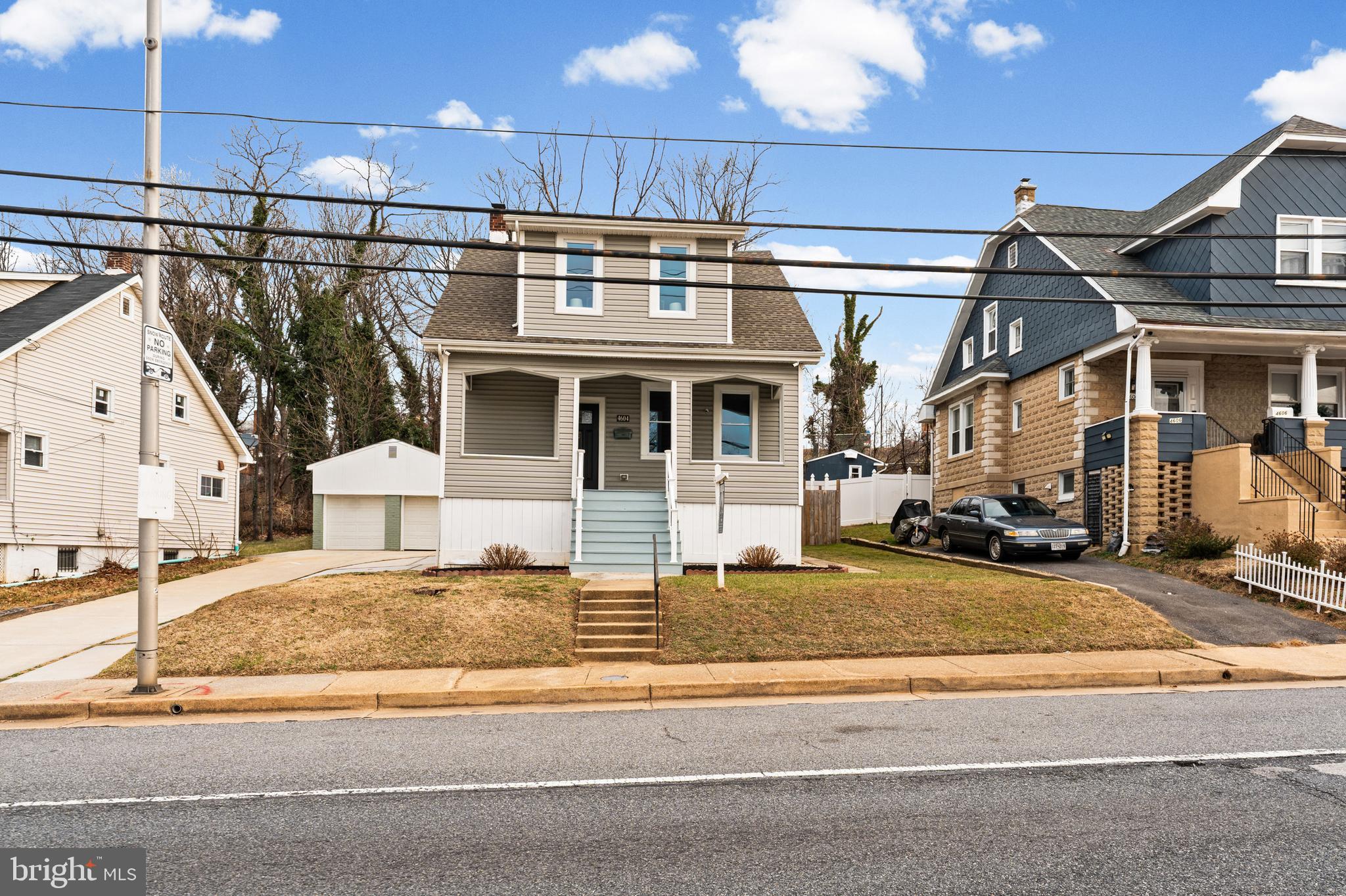 4604 Moravia Road Baltimore, MD 21206 - Photo 8 of 50 a view of a white house with large windows next to a road