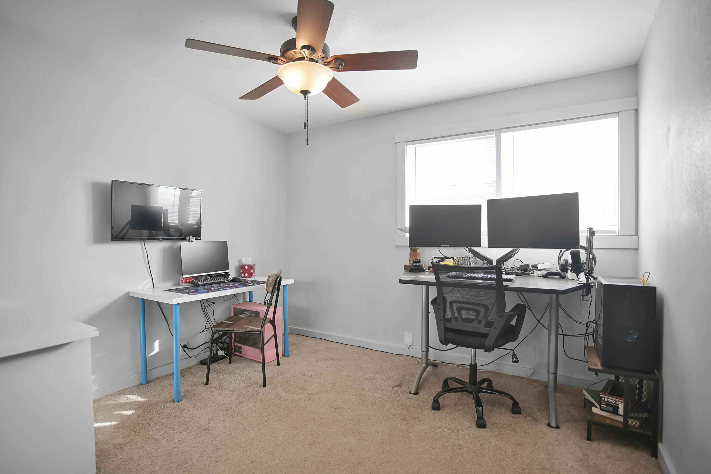2519 62nd Street Lubbock, TX 79413 - Photo 15 of 30 a view of a workspace with furniture and a window