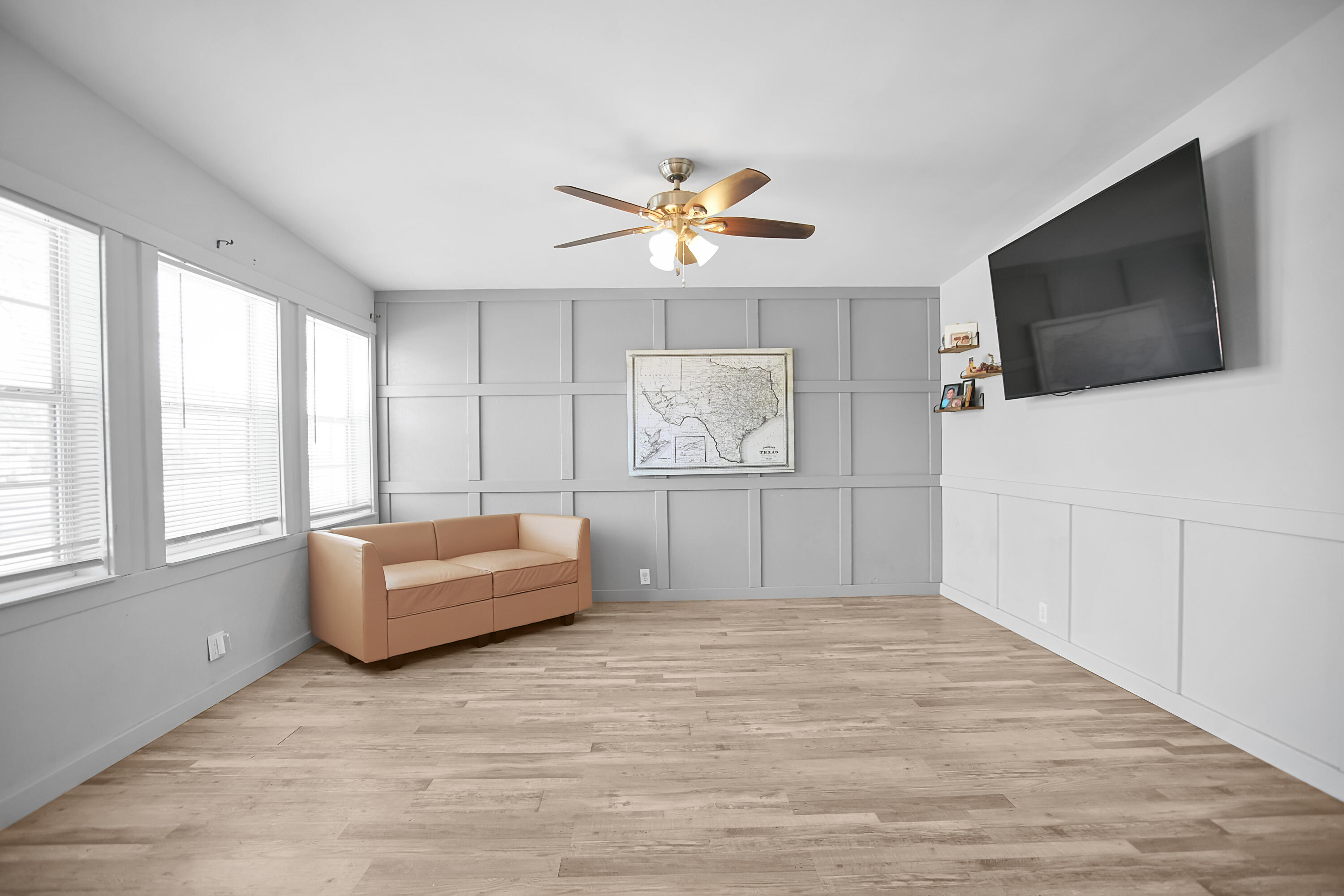 2519 62nd Street Lubbock, TX 79413 - Photo 4 of 30 a living room with furniture and a flat screen tv