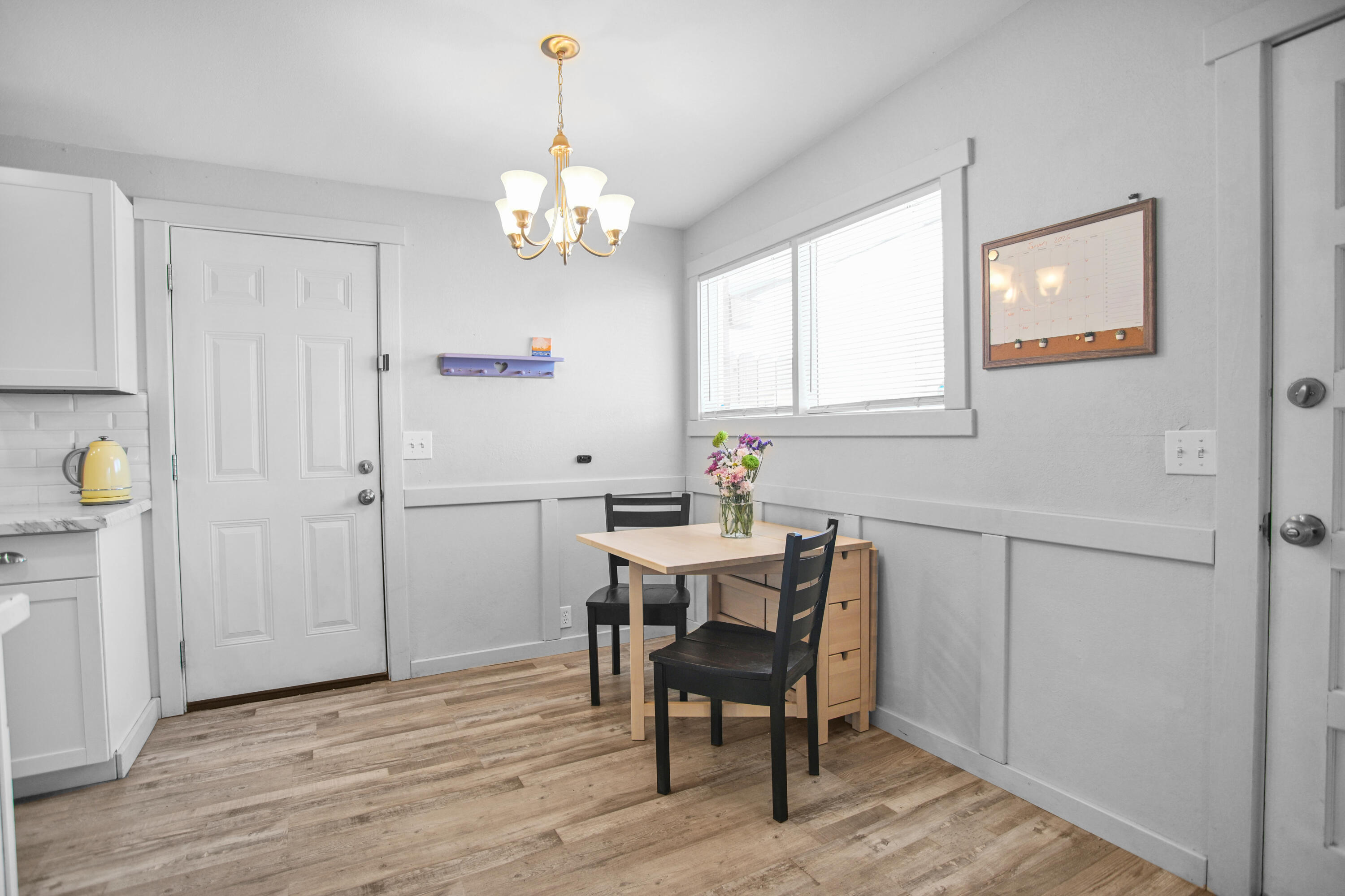 2519 62nd Street Lubbock, TX 79413 - Photo 9 of 30 a view of a dining room with furniture and chandelier