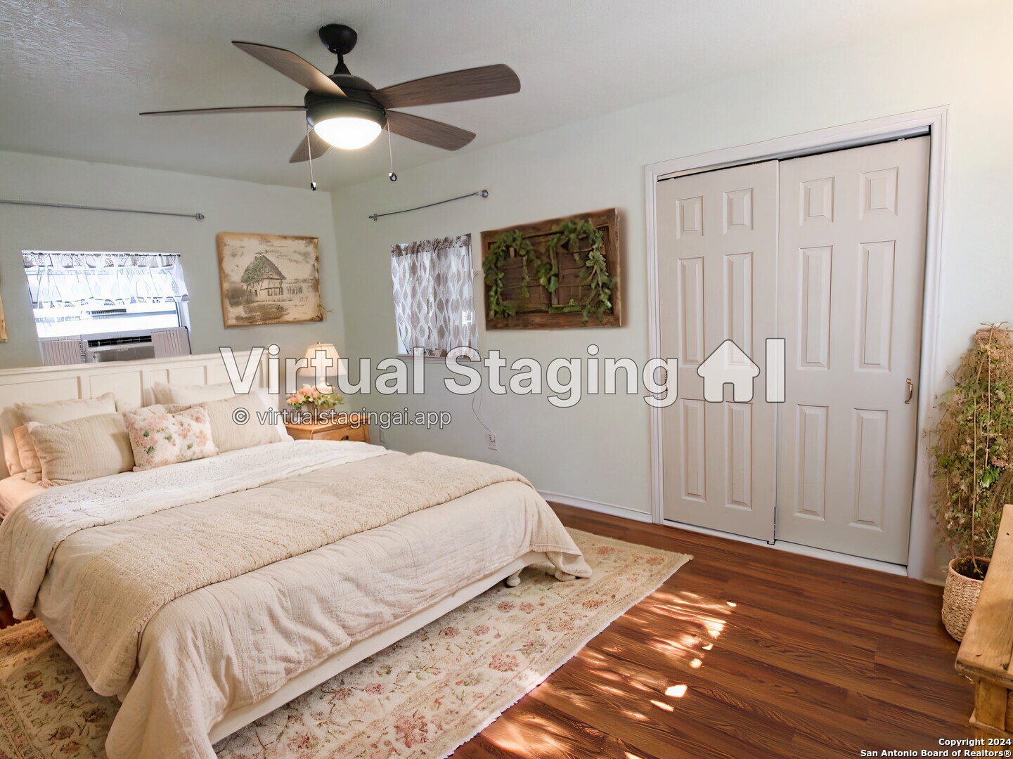 1468 Pebble Beach Road Lakehills, TX 78063 - Photo 17 of 23 a bedroom with a large bed and a chandelier