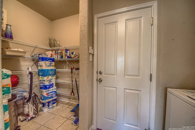 a view of storage and utility room