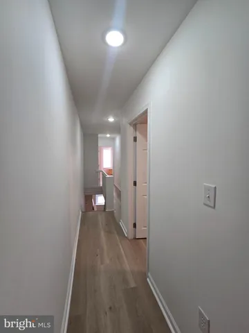 a bathroom with a sink toilet and mirror