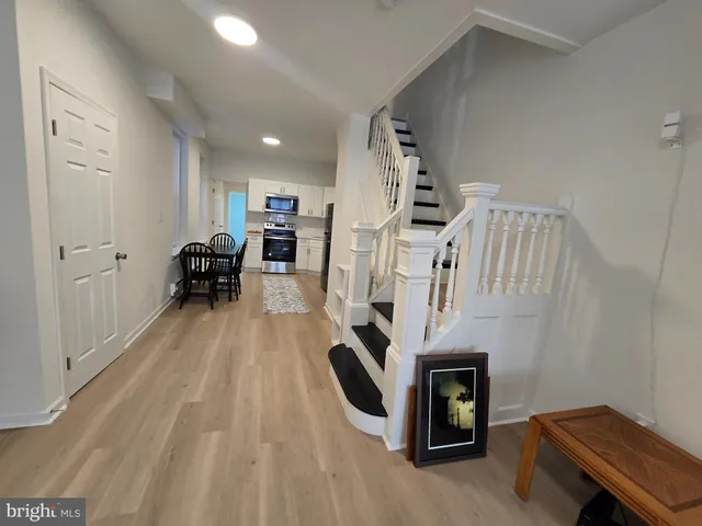a view of livingroom with furniture and wooden floor