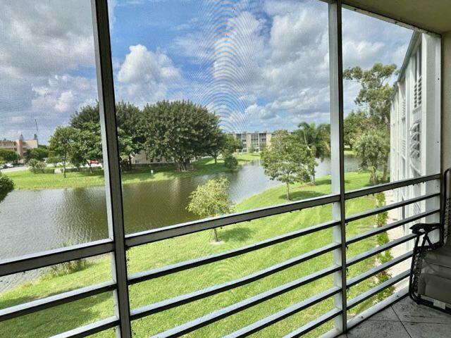 3027 Lincoln B Boca Raton, FL 33434 - Photo 10 of 34 Screened Patio w/Lake View