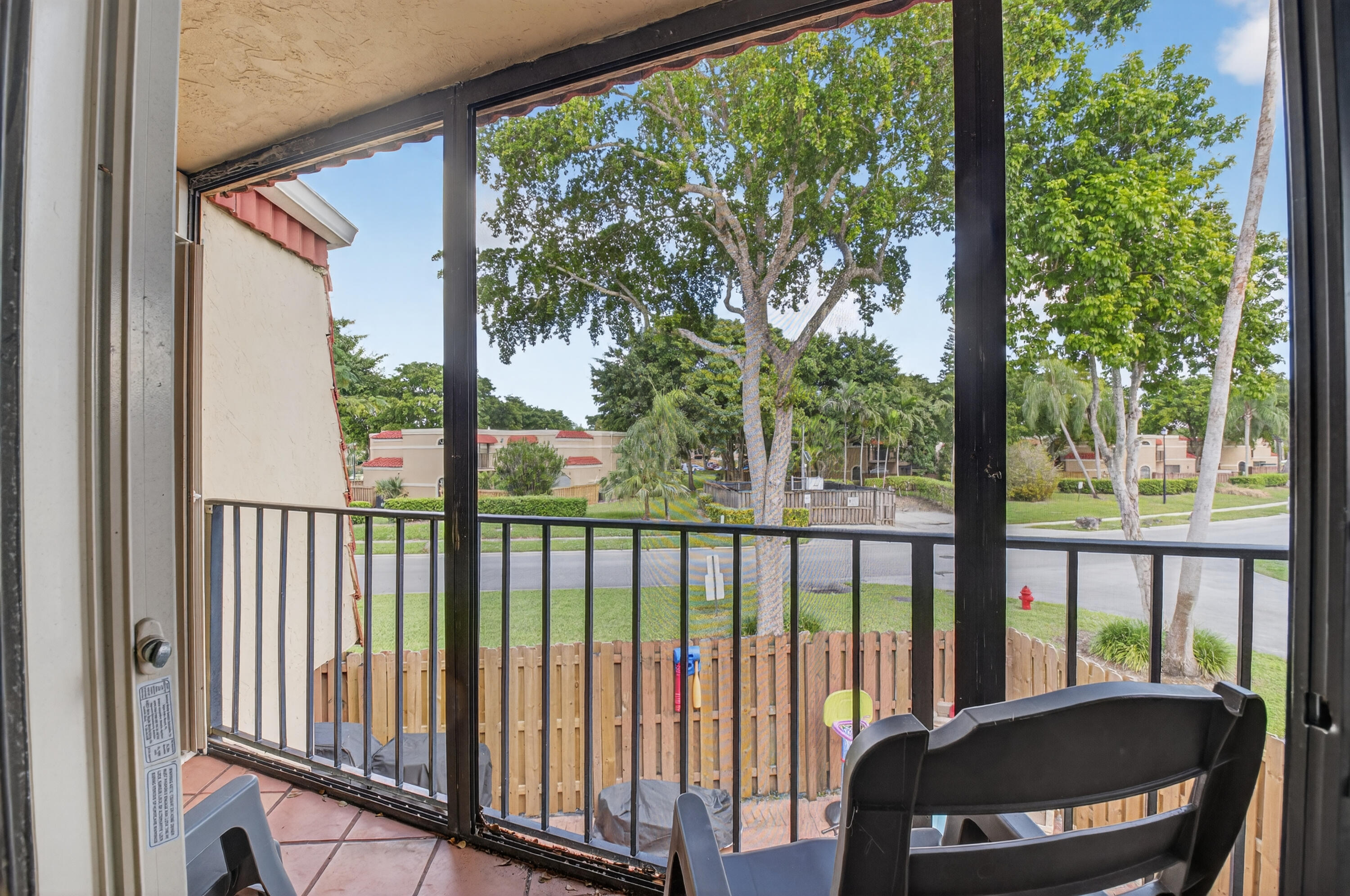 8200 Thames Boulevard, Unit C Boca Raton, FL 33433 - Photo 14 of 45 a view of a balcony with a swing