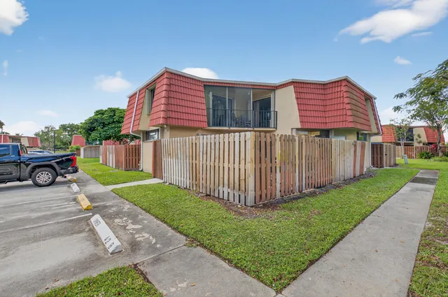 a view of a backyard with a garden