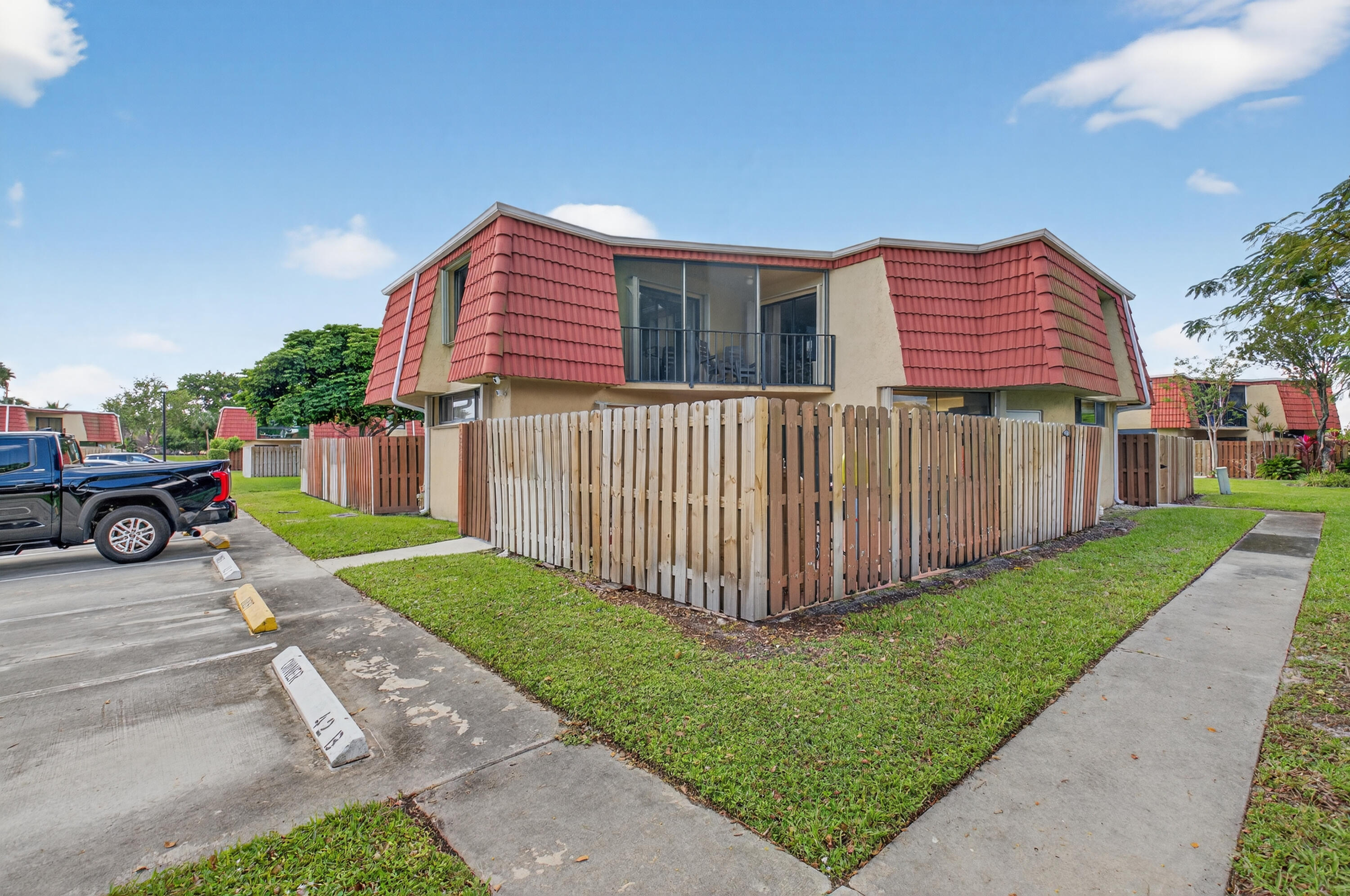 8200 Thames Boulevard, Unit C Boca Raton, FL 33433 - Photo 2 of 45 a view of a backyard with a garden
