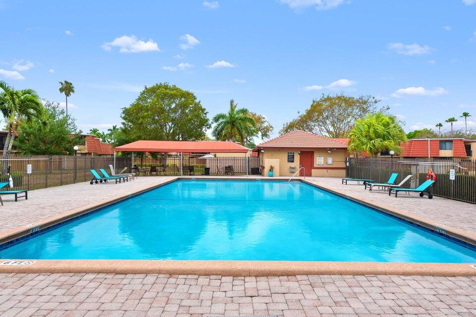 8200 Thames Boulevard, Unit C Boca Raton, FL 33433 - Photo 33 of 45 a view of swimming pool with seating space