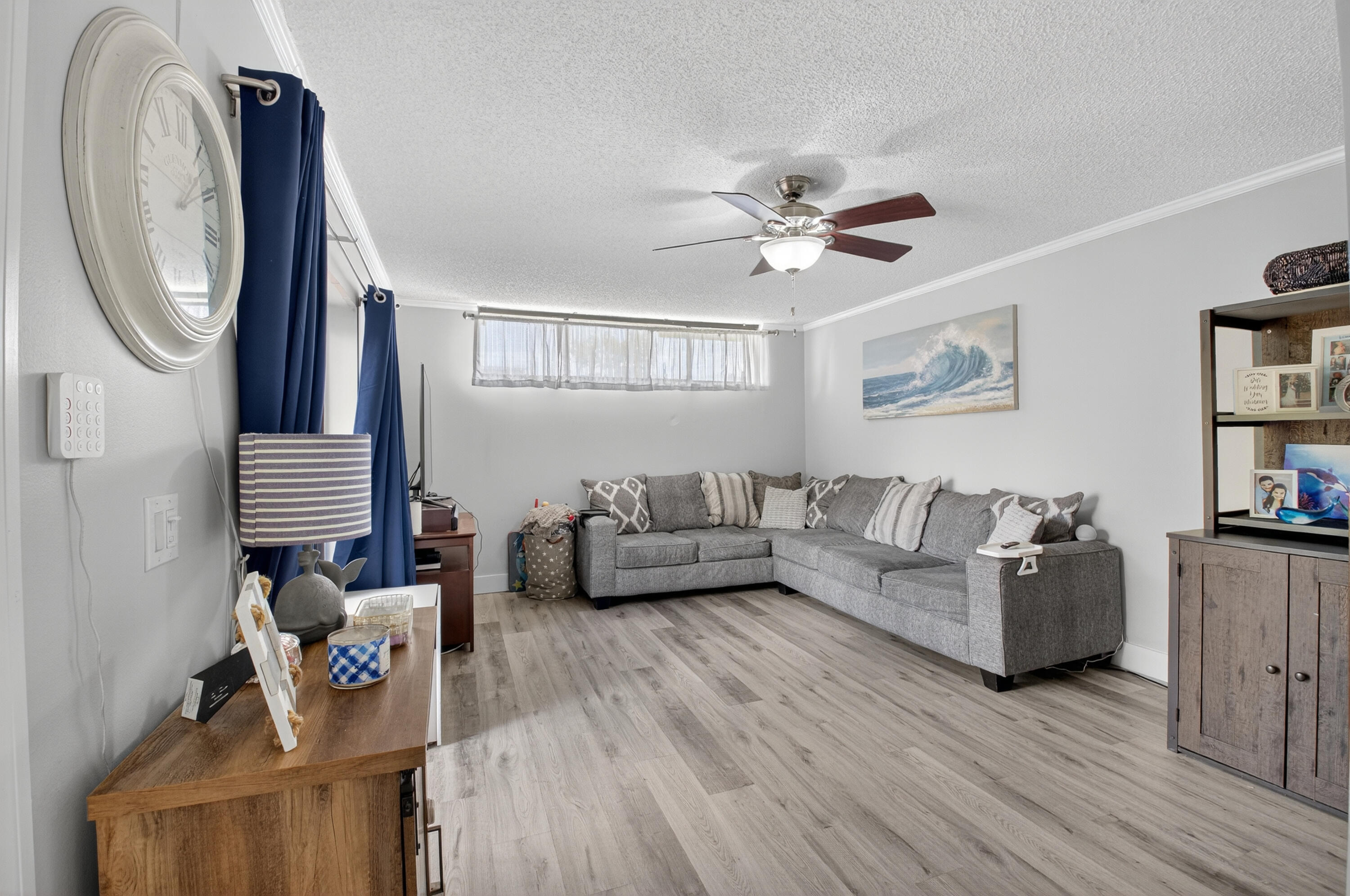 8200 Thames Boulevard, Unit C Boca Raton, FL 33433 - Photo 7 of 45 a living room with furniture and a wooden floor
