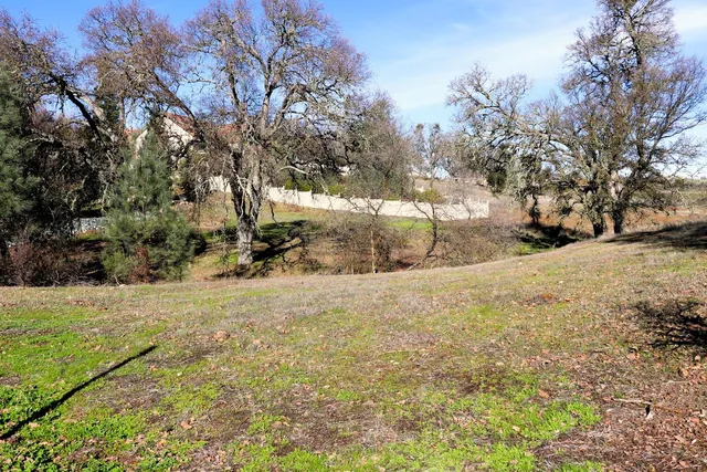 a view of snow on the side of a road