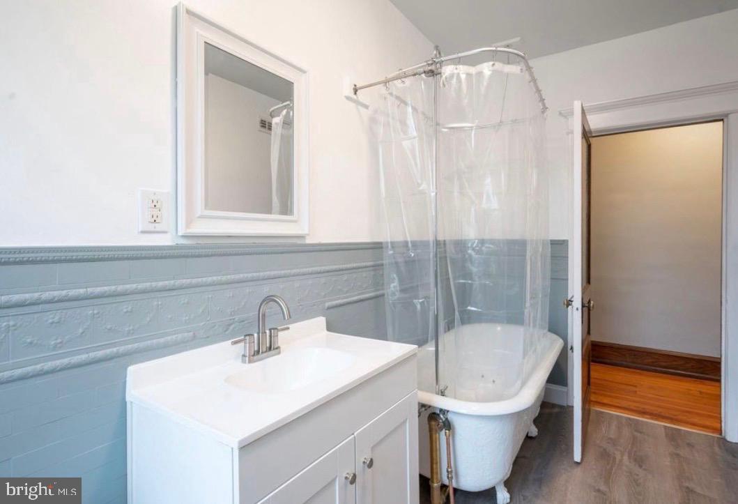 239 Kings Highway East, Unit B Haddonfield, NJ 08033 - Photo 5 of 14 a bathroom with a sink toilet and shower