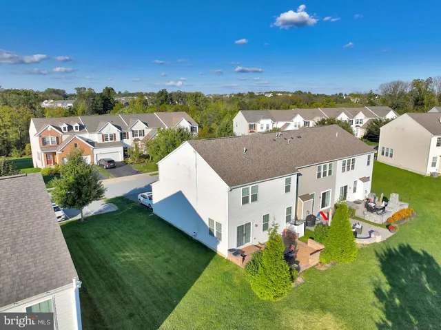 a view of a house with a big yard