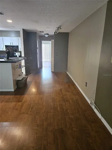 a view of a kitchen with a sink