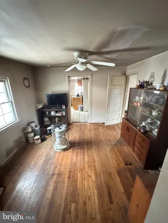 a view of a living room and dining room