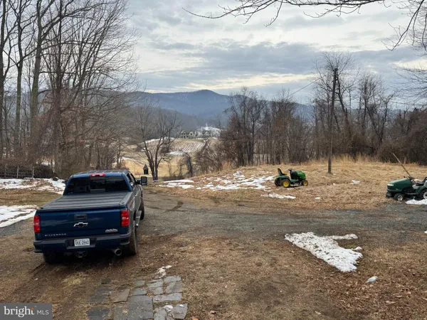 a view of a street with fire pit
