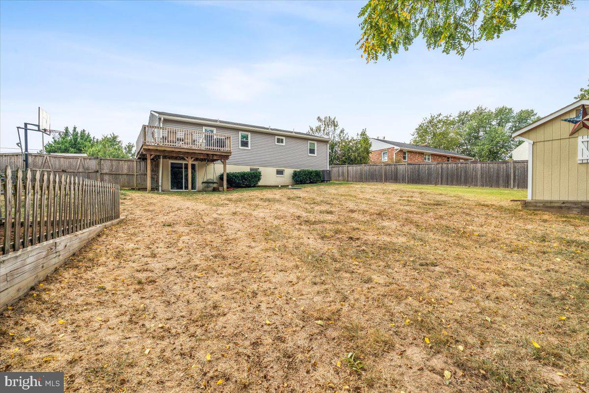 7830 Fingerboard Road Frederick, MD 21704 - Photo 31 of 39 a backyard of a house with wooden fence