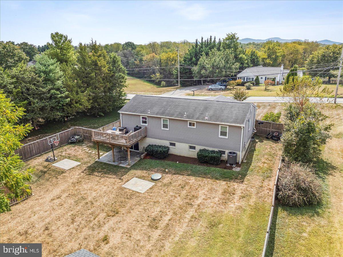 7830 Fingerboard Road Frederick, MD 21704 - Photo 33 of 39 a view of a house with a yard and sitting area