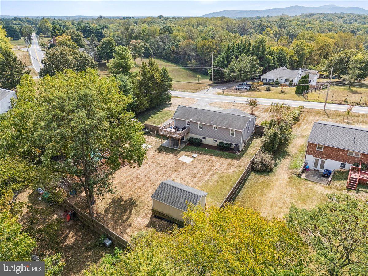 7830 Fingerboard Road Frederick, MD 21704 - Photo 36 of 39 an aerial view of a house with a yard and lake view