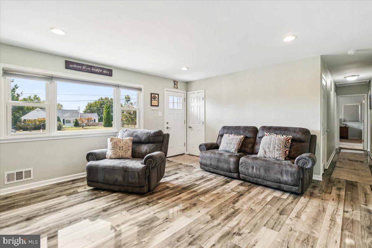 7830 Fingerboard Road Frederick, MD 21704 - Photo 7 of 39 a living room with furniture and a large window