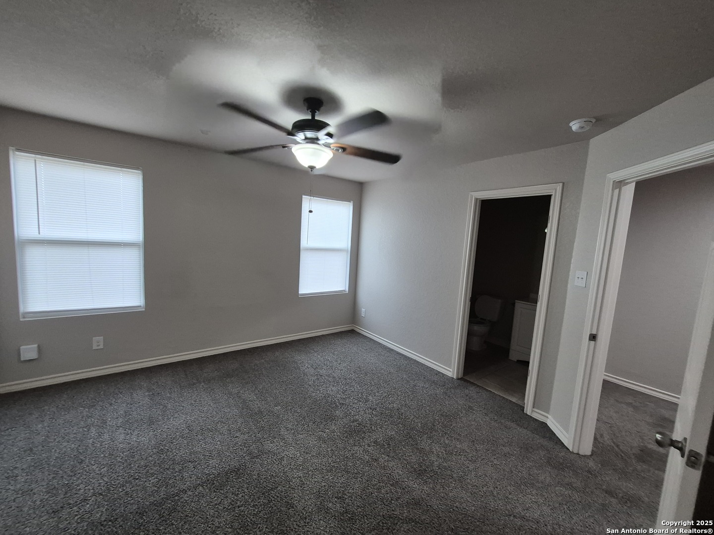 7315 Colina Way, Unit 103 Converse, TX 78109 - Photo 17 of 32 a view of an empty room with a window