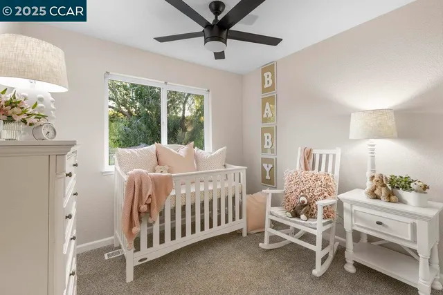 a bedroom with furniture and windows