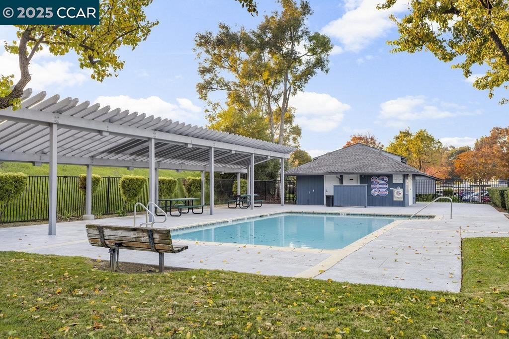 1048 Spring Valley Common Livermore, CA 94551 - Photo 36 of 37 a view of a house with swimming pool and sitting area