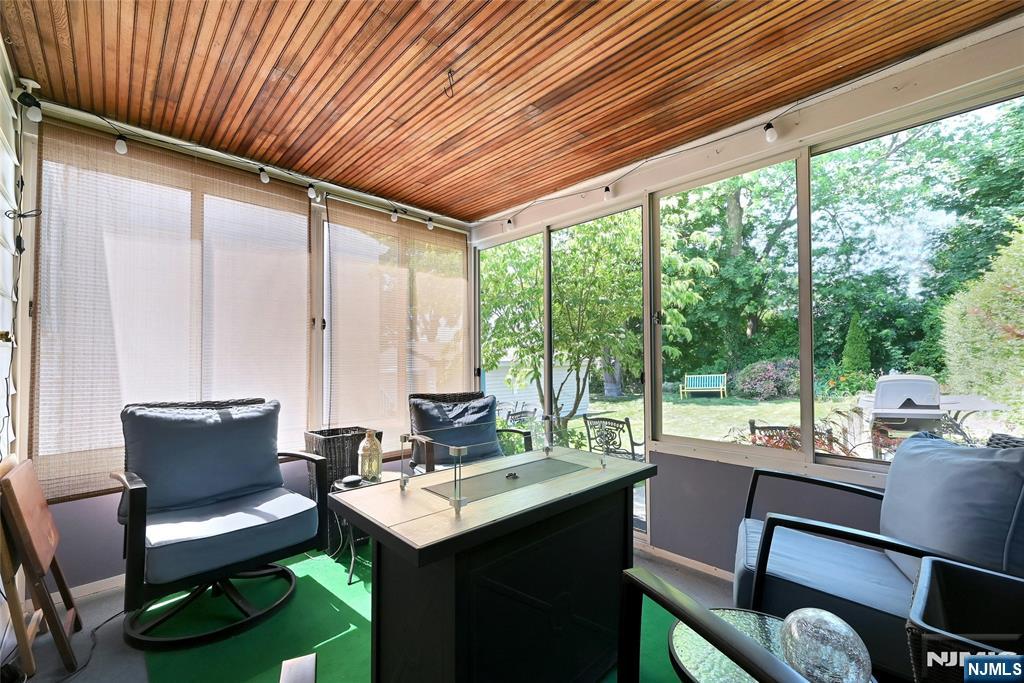 85 Edison Street Clifton, NJ 07013 - Photo 18 of 28 a view of a dining room with furniture window and outside view