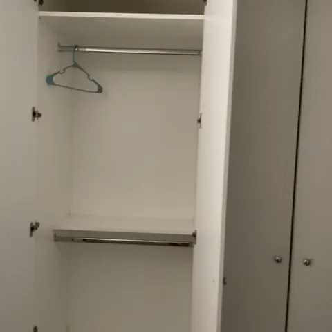 a close up view of a rack on the wall