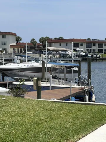 a view of a water fountain and a terrace