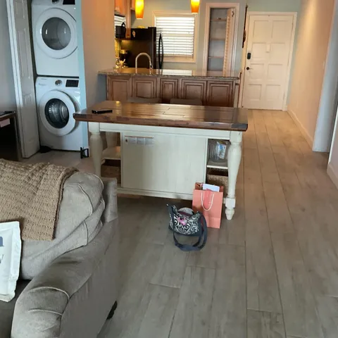 a bedroom with a bed and cabinets