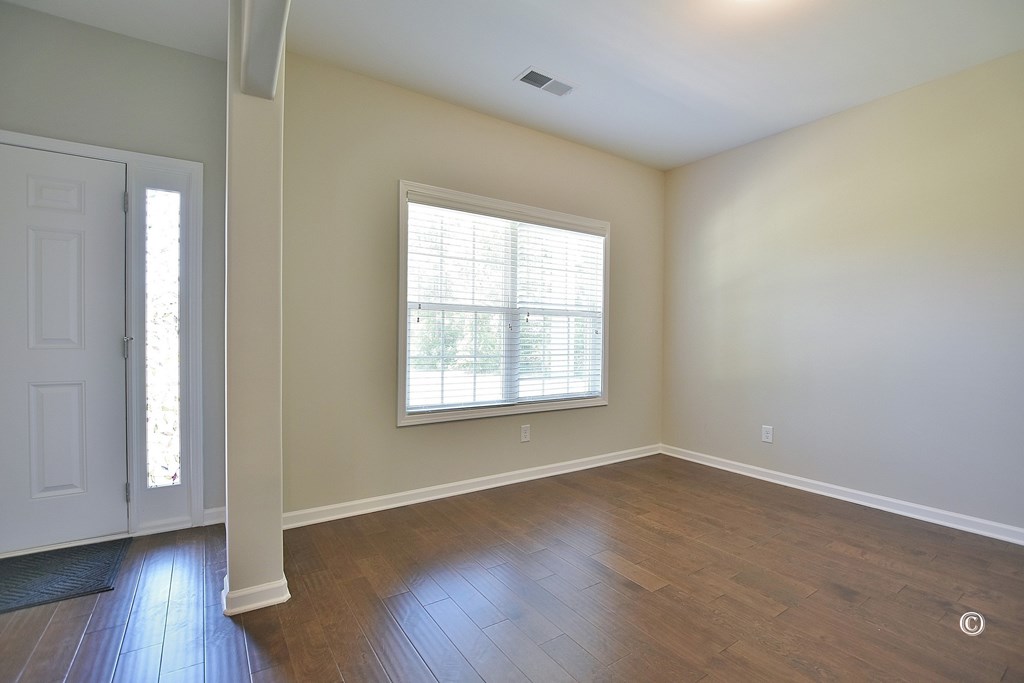 57 Hart Ridge Court Hamilton, GA 31811 - Photo 5 of 33 Living Room/ Flex Room with Arched Opening