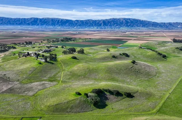 a view of an ocean and a yard