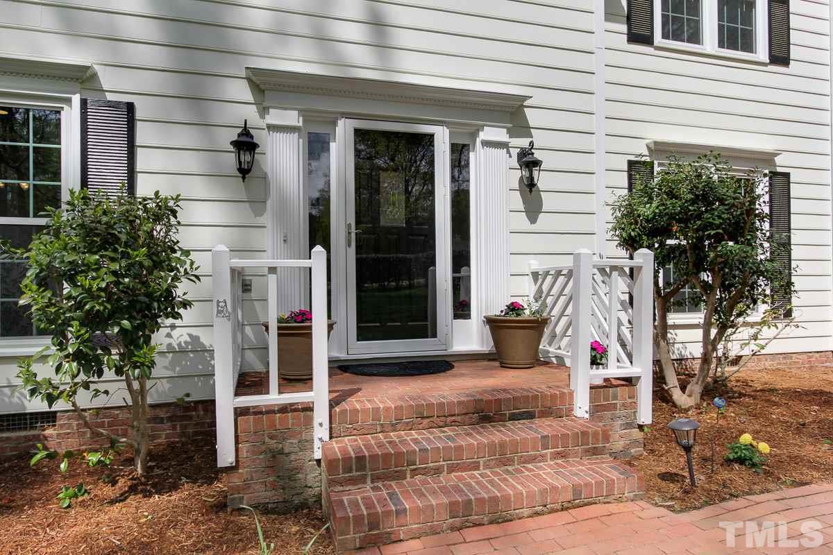 2000 Corberrie Lane Raleigh, NC 27613 - Photo 3 of 25 a front view of a house with a garage