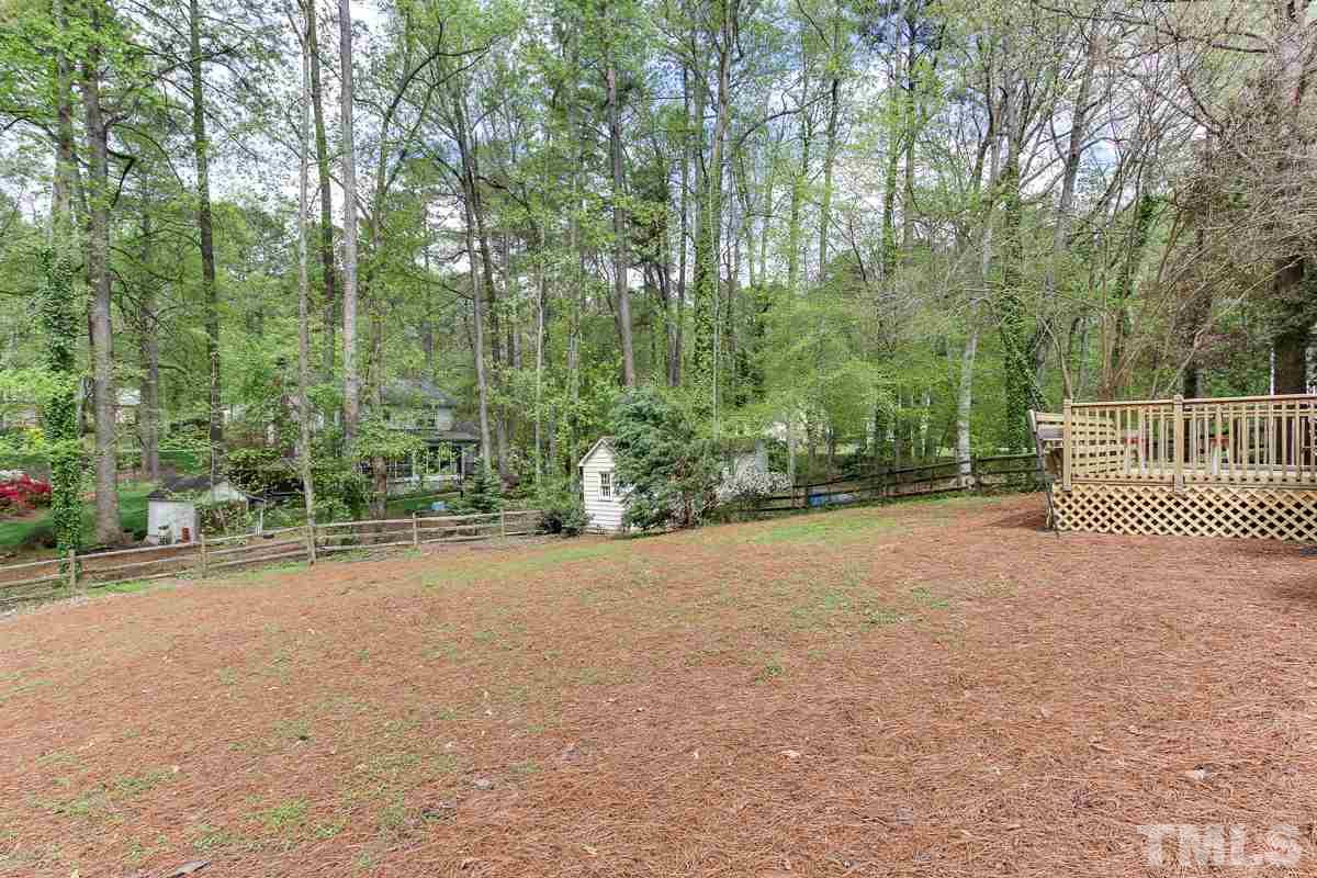 2000 Corberrie Lane Raleigh, NC 27613 - Photo 24 of 25 a view of a street with a trees