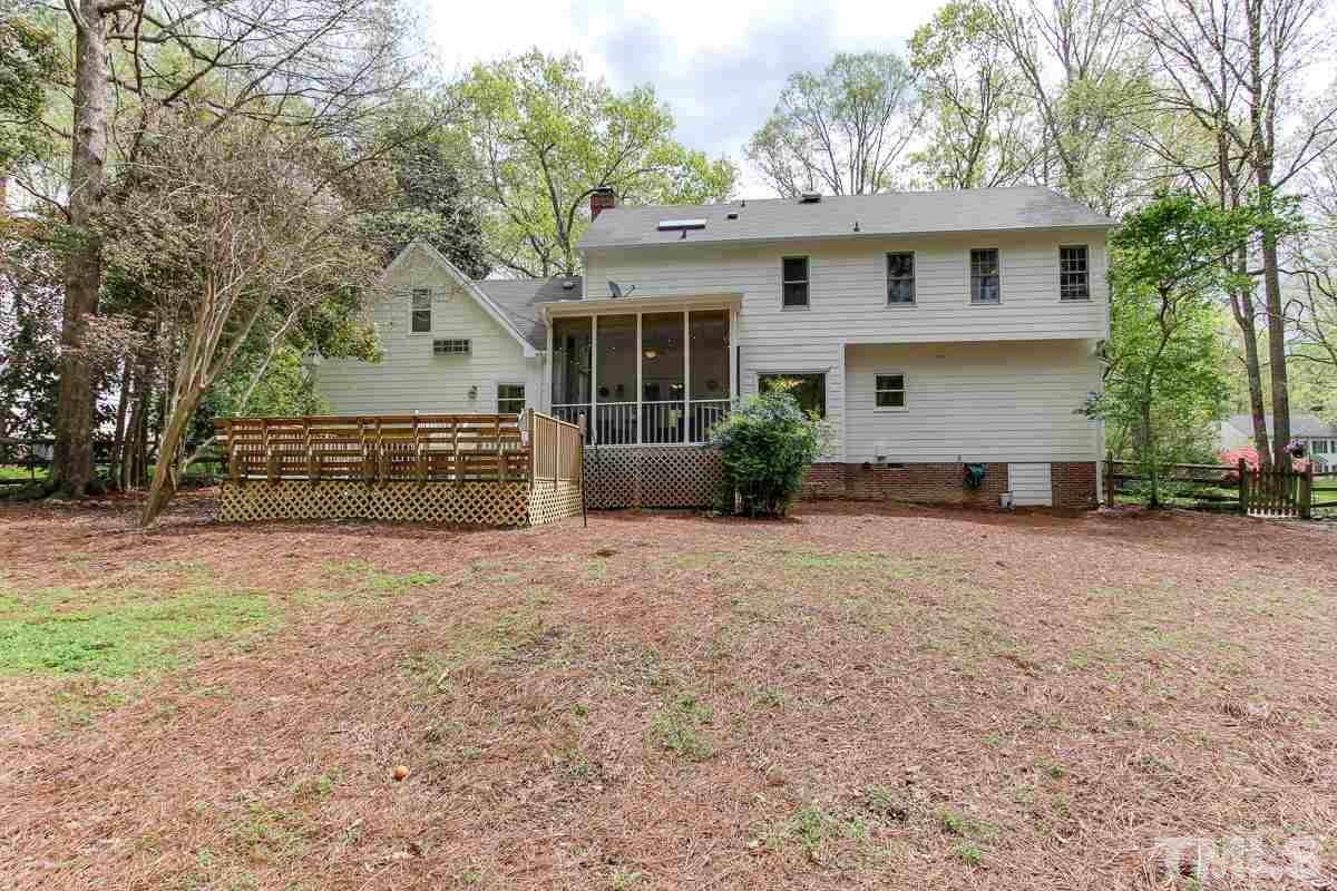 2000 Corberrie Lane Raleigh, NC 27613 - Photo 25 of 25 a front view of house with deck and yard