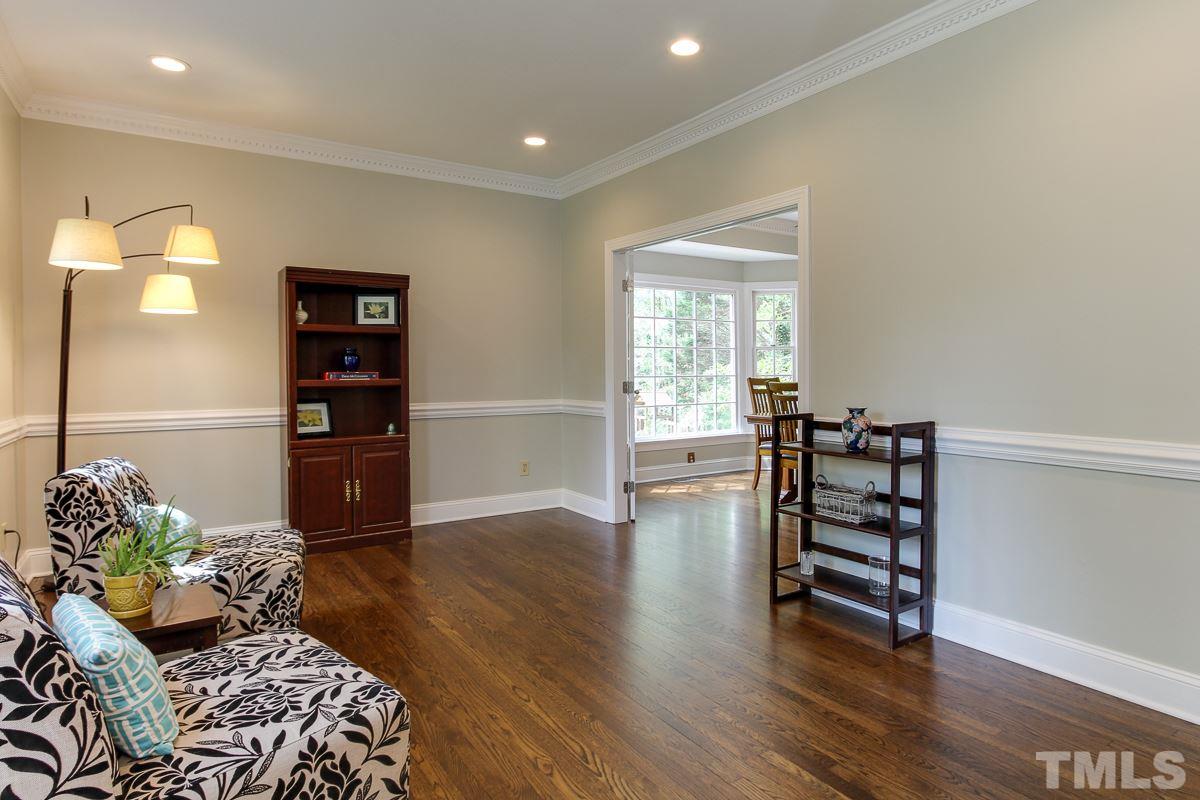 2000 Corberrie Lane Raleigh, NC 27613 - Photo 4 of 25 a living room with furniture and wooden floor