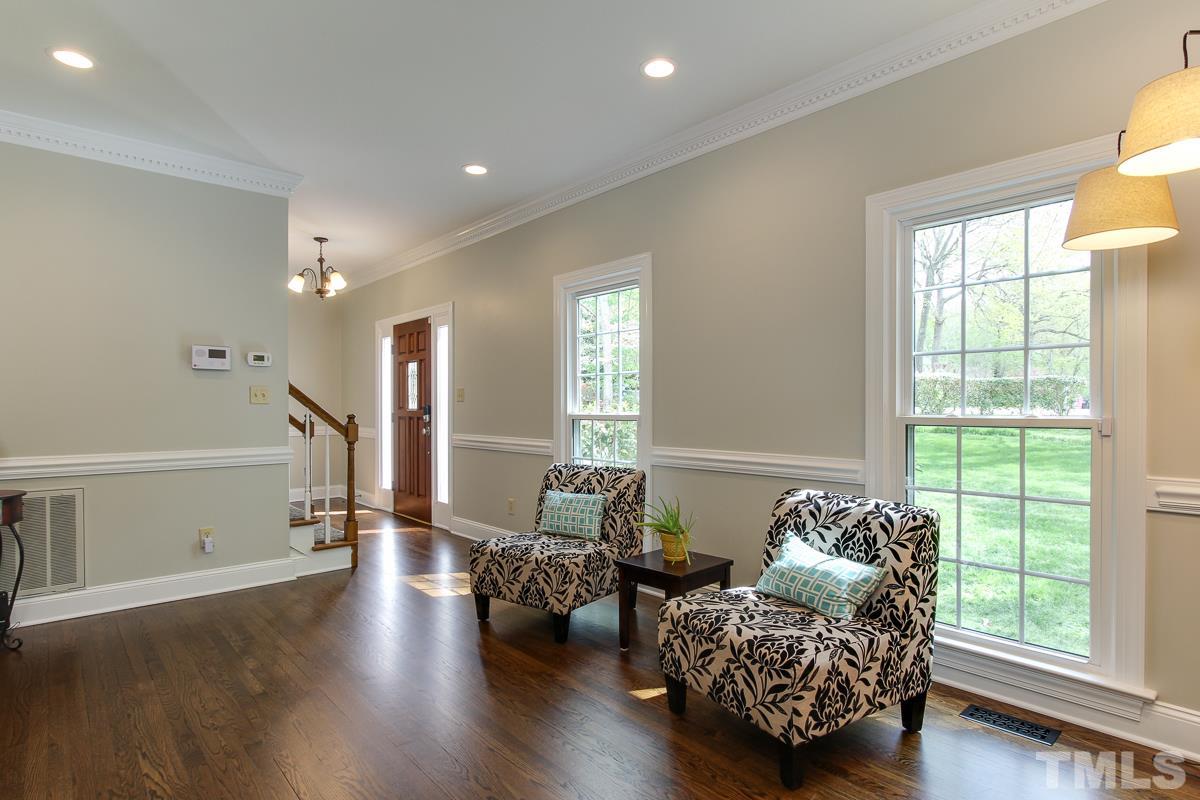 2000 Corberrie Lane Raleigh, NC 27613 - Photo 5 of 25 a living room with furniture and a window