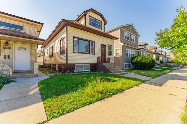 $449,000 | 5335 West Barry Avenue, Chicago, IL 60641
