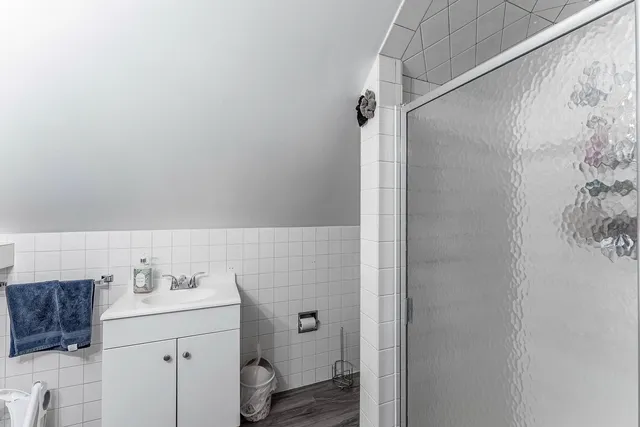 a bathroom with a sink toilet and vanity