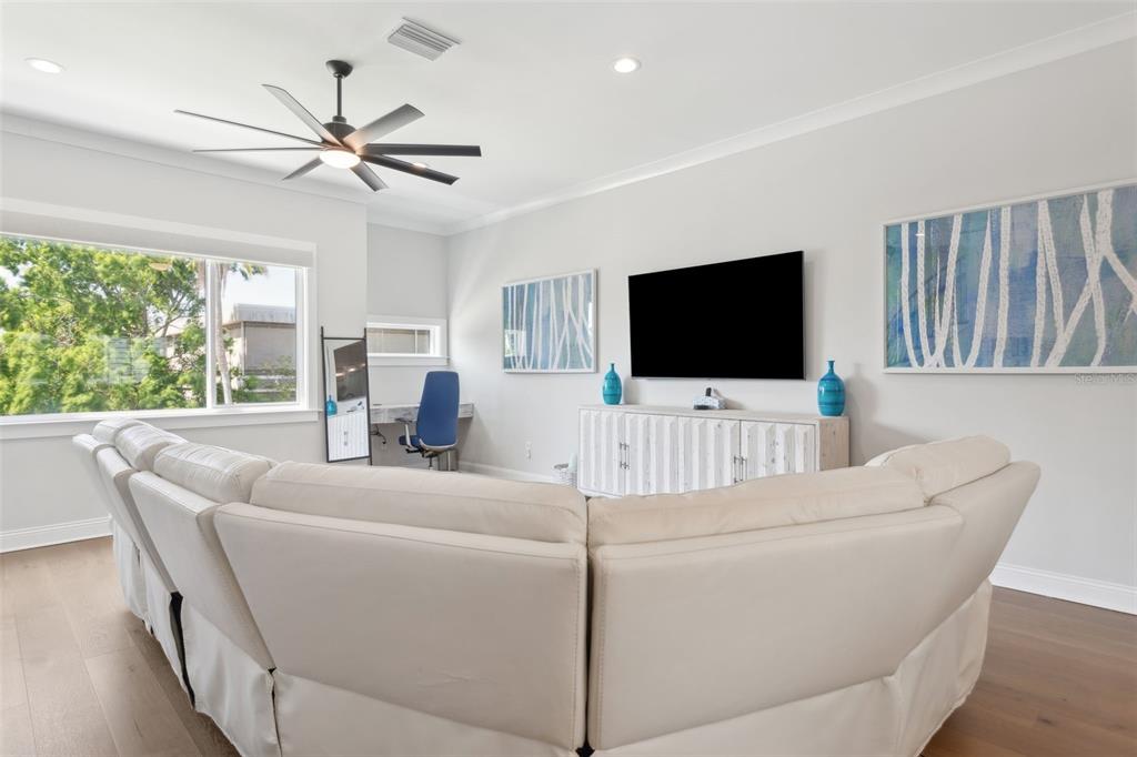 4515 West North A Street, Unit 2 Tampa, FL 33609 - Photo 5 of 21 a living room with furniture and a flat screen tv