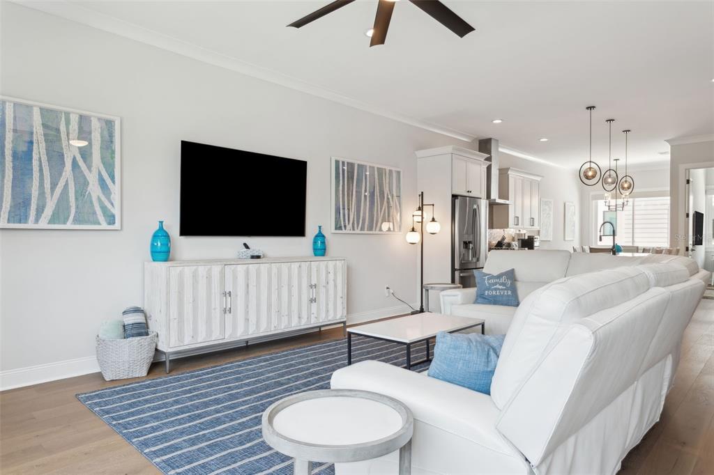 4515 West North A Street, Unit 2 Tampa, FL 33609 - Photo 6 of 21 a living room with furniture and a flat screen tv