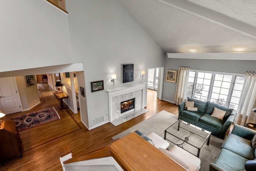 326 Highland Avenue Newton, MA 02465 - Photo 22 of 42 a living room with furniture fireplace and flat screen tv
