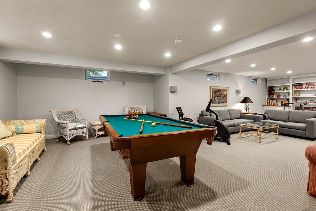 326 Highland Avenue Newton, MA 02465 - Photo 34 of 42 a living room with furniture a pool and a couch