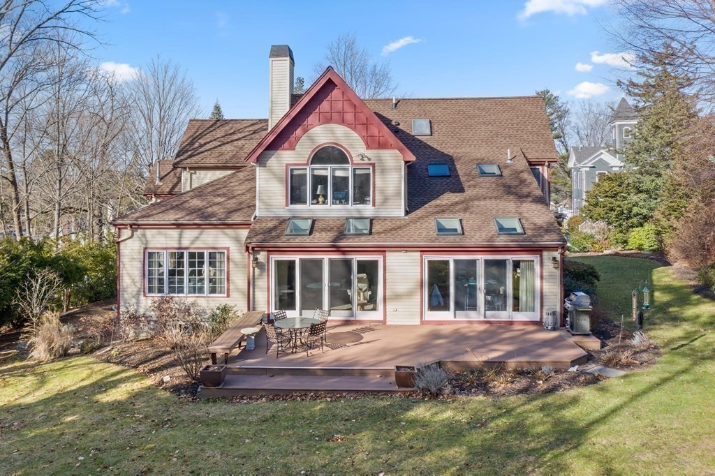326 Highland Avenue Newton, MA 02465 - Photo 35 of 42 a front view of a house with a yard