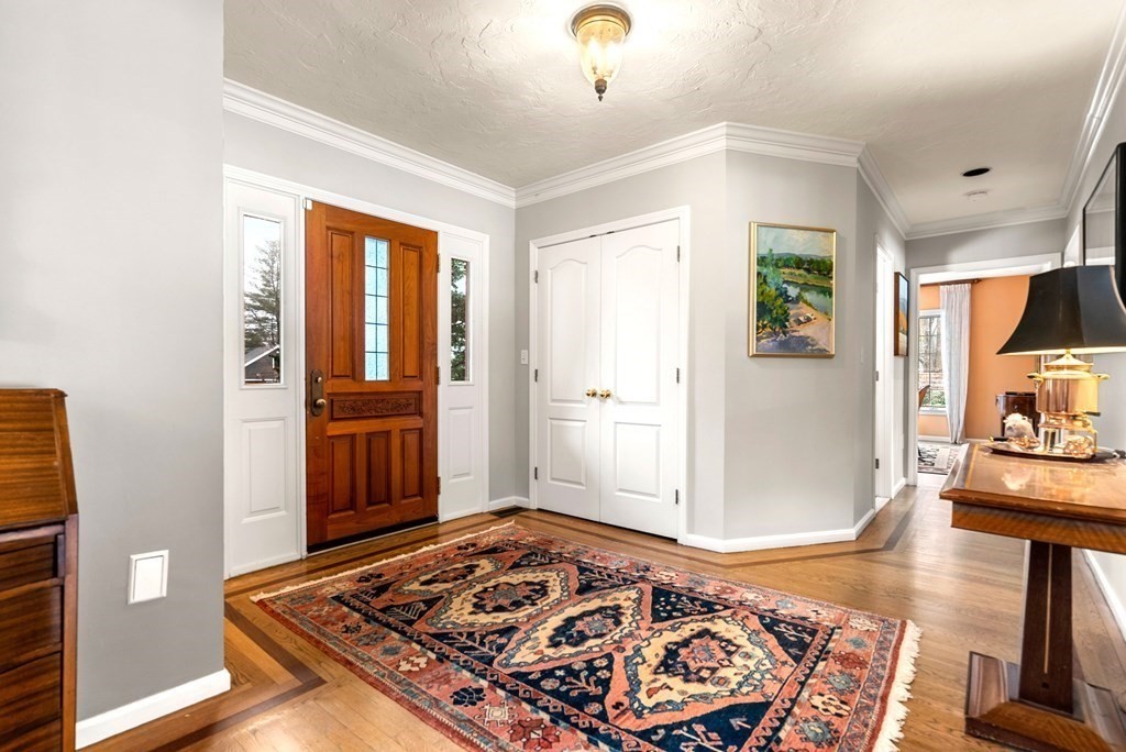 326 Highland Avenue Newton, MA 02465 - Photo 4 of 42 a bedroom with a bed and a television