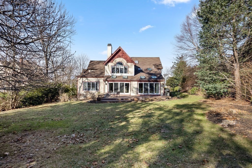326 Highland Avenue Newton, MA 02465 - Photo 41 of 42 a front view of a house with a garden