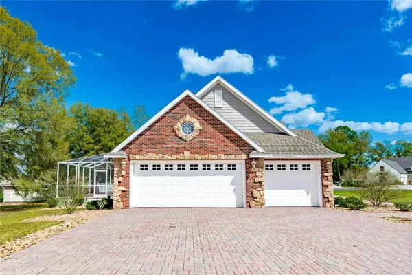 a view of a livingroom with furniture and a window