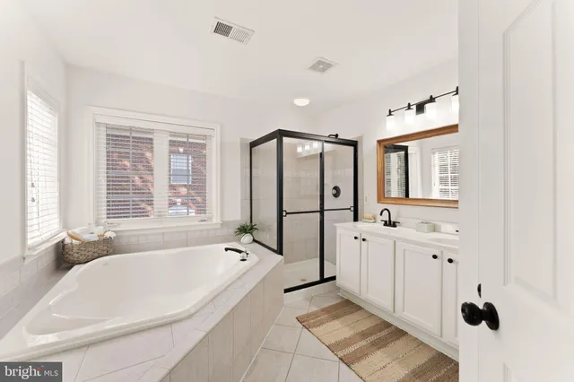a view of a room with furniture and a potted plant