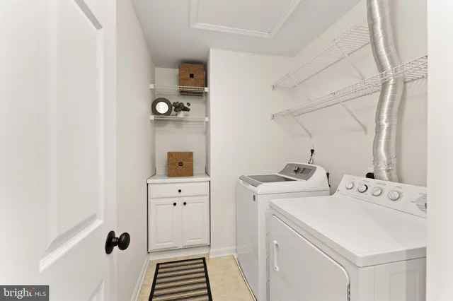 a view of a house with swimming pool and sitting area